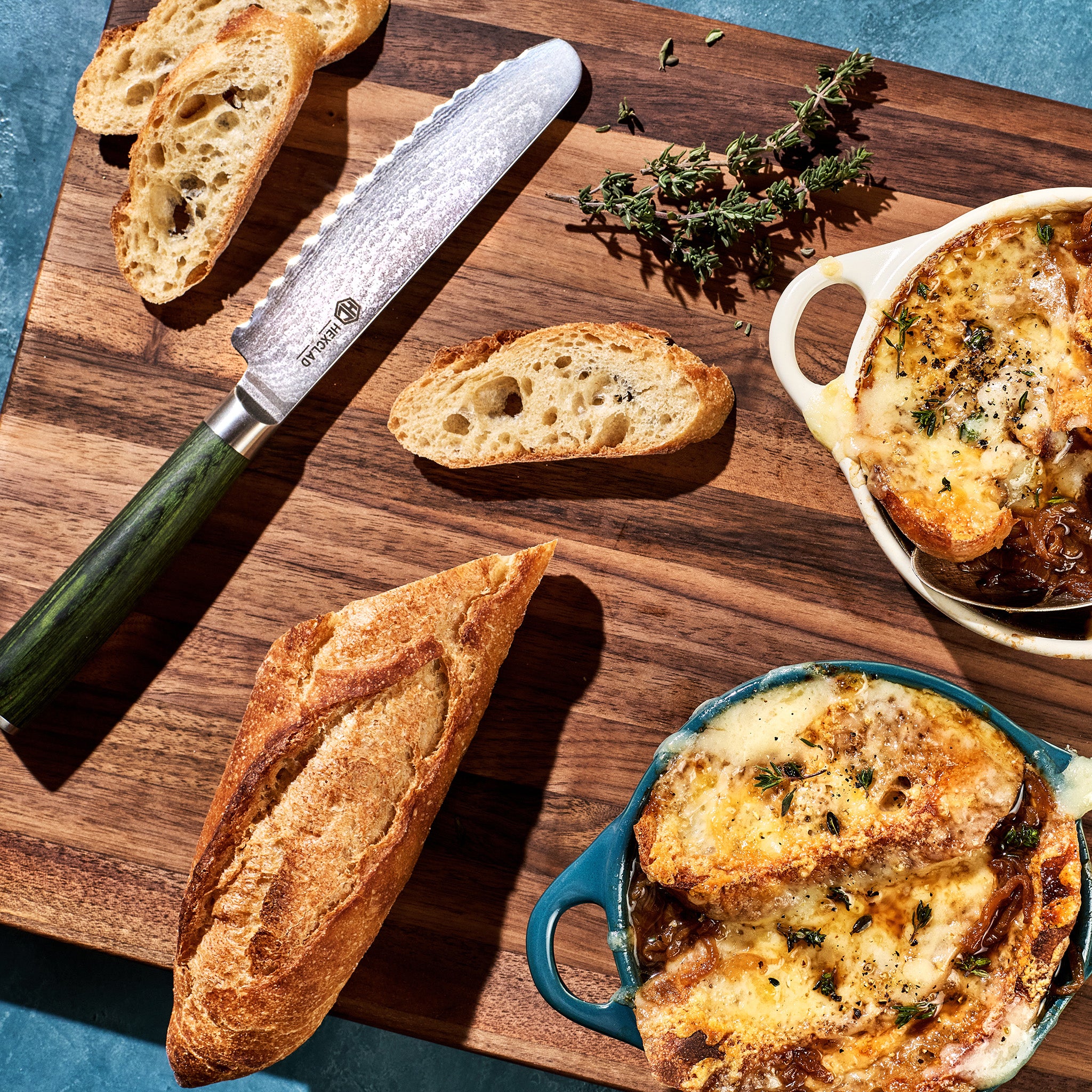 HexClad_MediumWalnutBoardV2_KWWB20-V2_5_BreadKnife_CTBK05-GPW_FrenchOnionSoup_012325_KF_02_03e3a333-0b0c-49da-bb00-01b7a0e5a2df.jpg